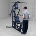 Working out using Body-Solid G3B Multi-Station Gym 12