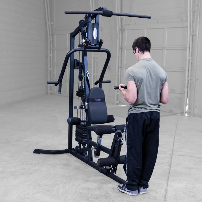 Working out using Body-Solid G3B Multi-Station Gym 12