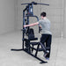 Working out using Body-Solid G3B Multi-Station Gym 4