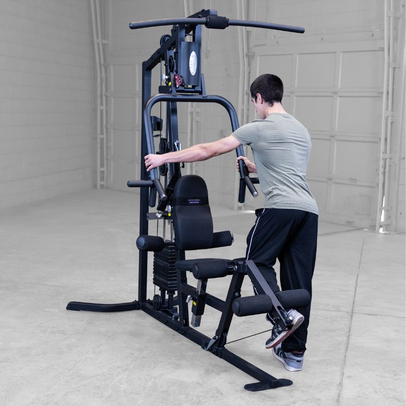 Working out using Body-Solid G3B Multi-Station Gym 4