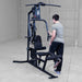 Working out using Body-Solid G3B Multi-Station Gym 5