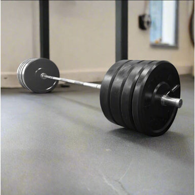 York 160kg Black Rubber Training Bumper Plate Set inside Gym