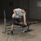 Body Solid Power Center Combo Bench | GDIB46L - Sample Exercise with dumbbell